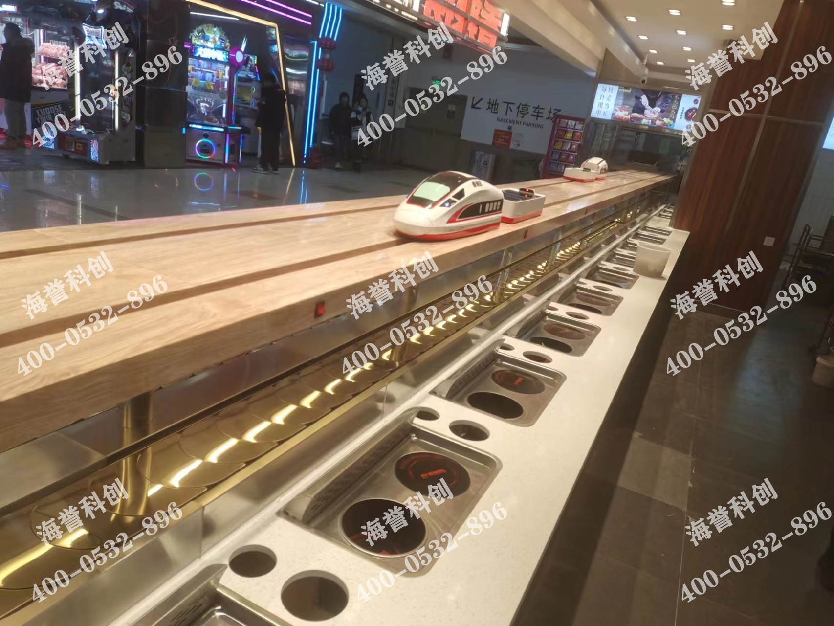 海譽科創(chuàng)內蒙古通遼涮烤一體小火鍋搭載智能送餐小火車安裝完成