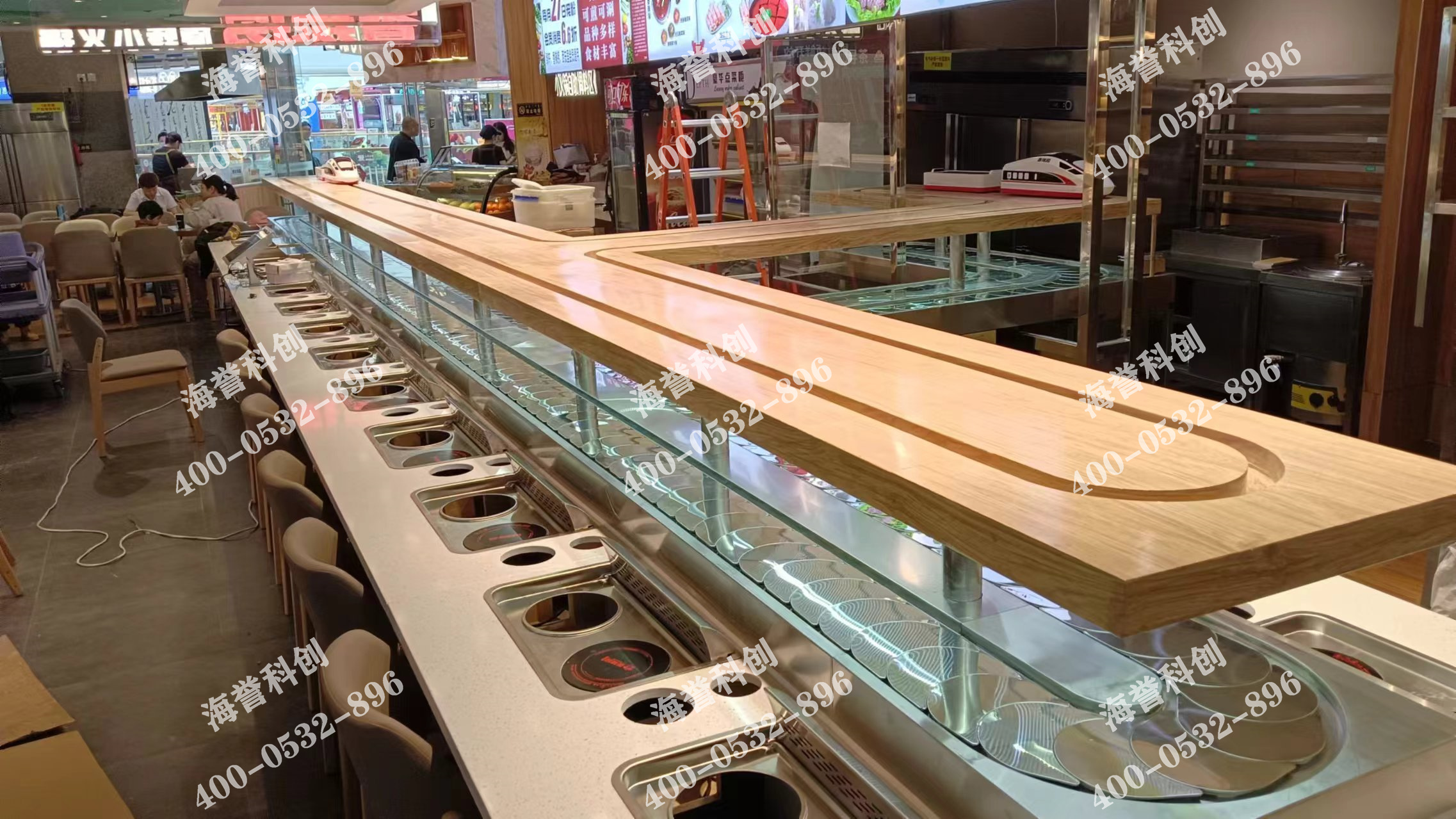 海譽科創(chuàng)內蒙古通遼涮烤一體小火鍋搭載智能送餐小火車安裝完成